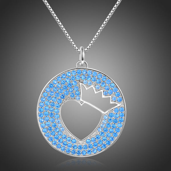 KHAISTA light blue crown heart necklace on white background