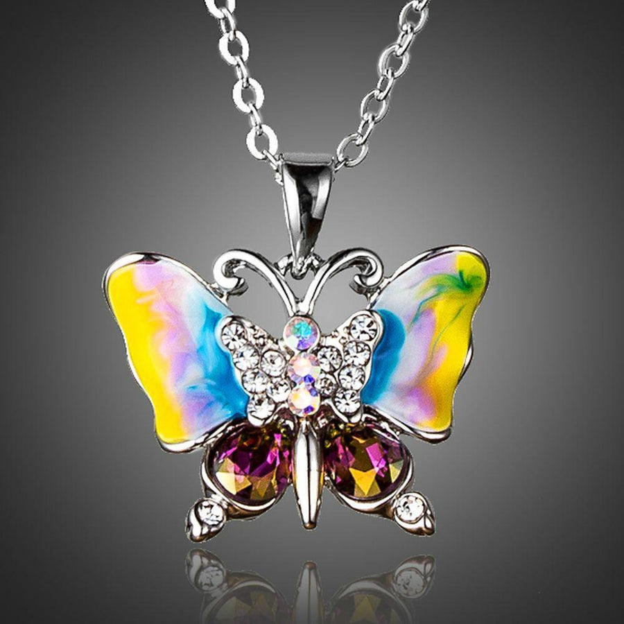 KHAISTA artistic crystal butterfly pendant necklace on white background