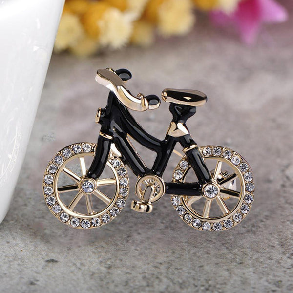 Khaista crystal bicycle brooch pin on white background