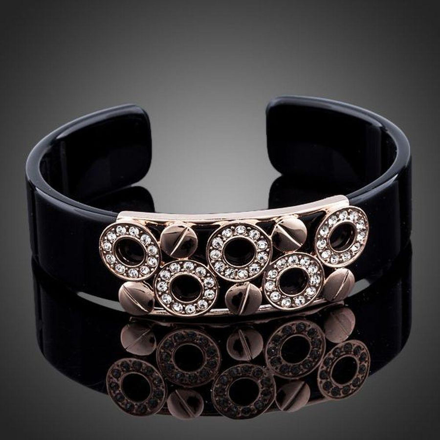 KHAISTA black round designer crystal bangle on white background