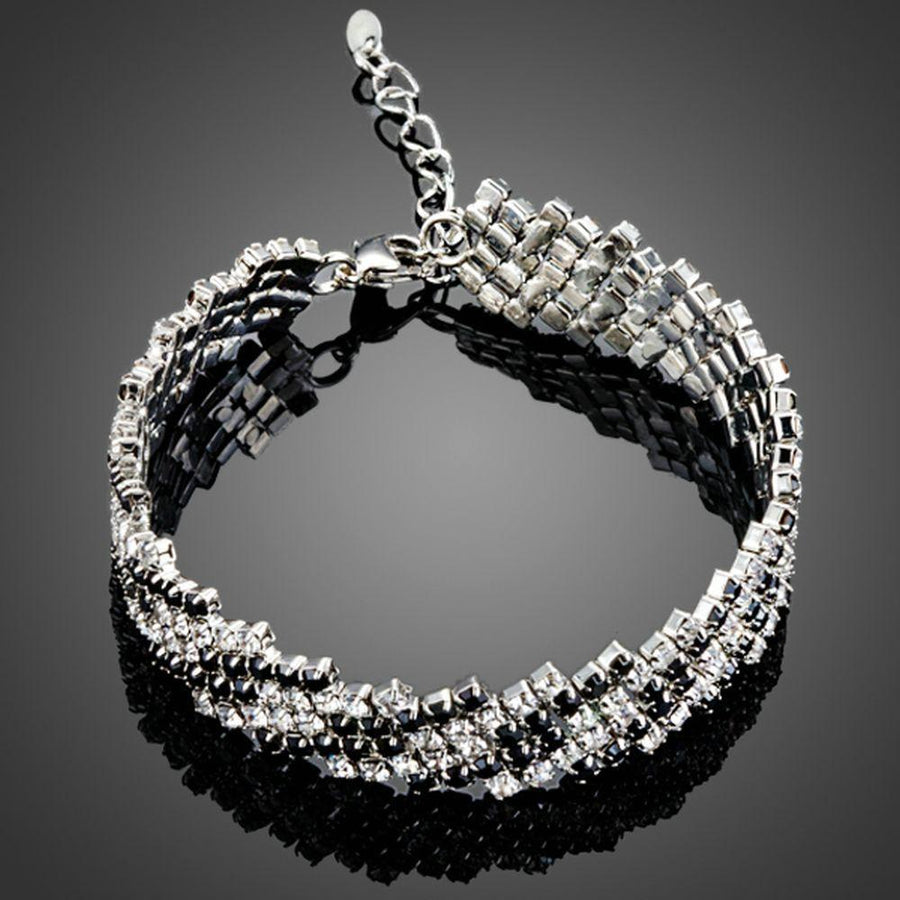 KHAISTA black zig zag CZ bracelet on white background
