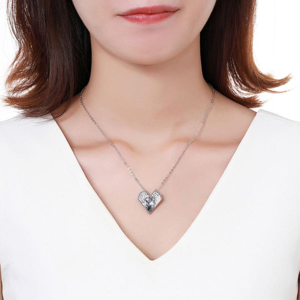 KHAISTA blue Austrian crystal vintage heart necklace on white background