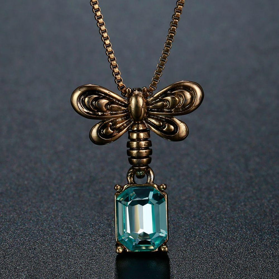 KHAISTA blue Austrian crystal pendant necklace on white background