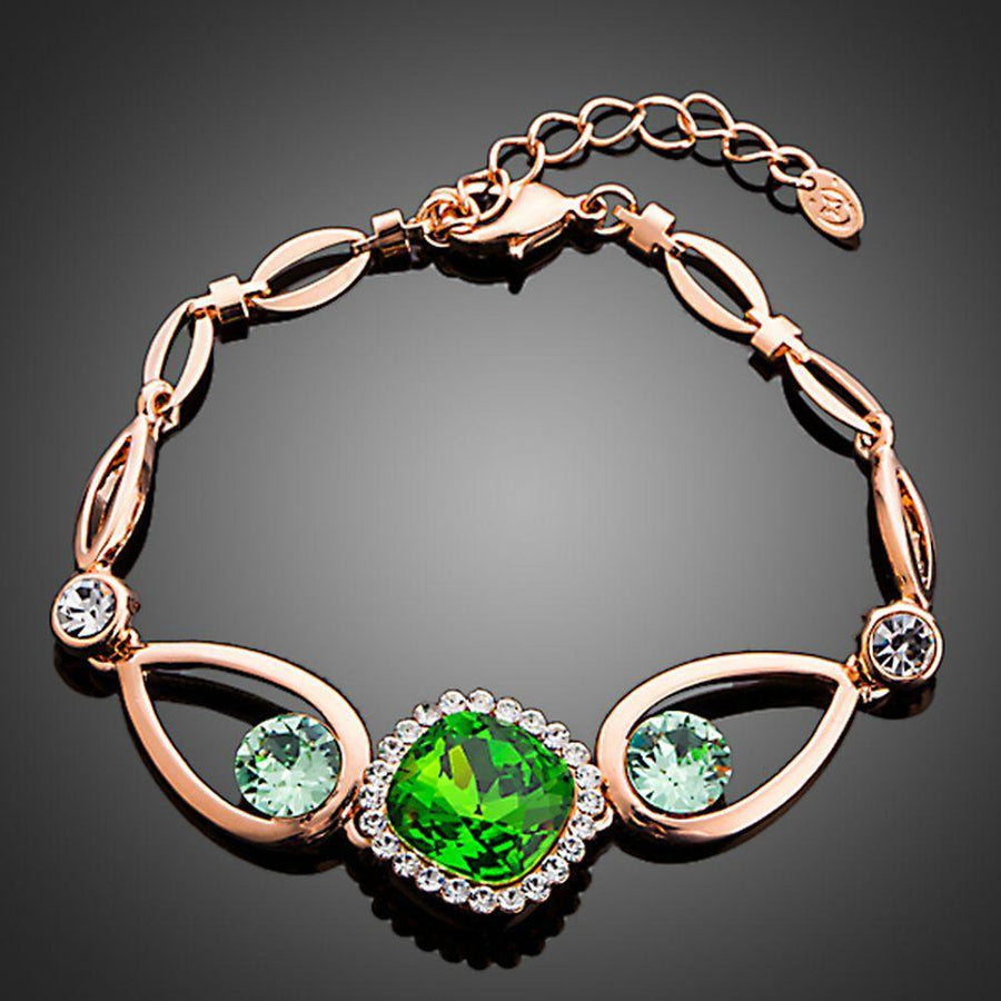 KHAISTA bold green stone designer bracelet on white background
