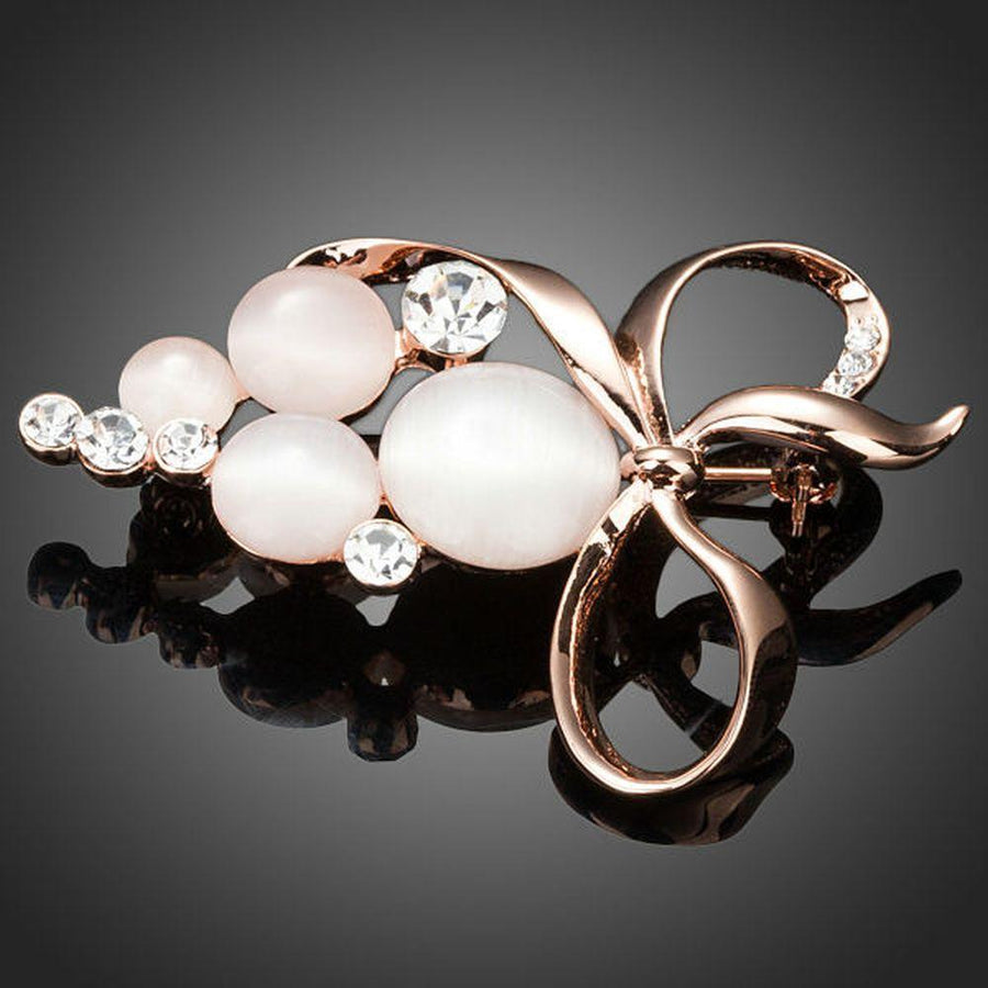 Khaista crystal bow knot brooch pin on white background