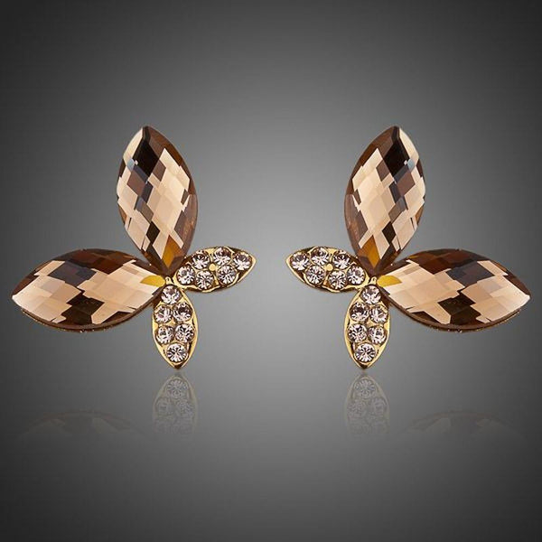 KHAISTA gold Stellux butterfly stud earrings on white background