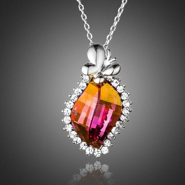 KHAISTA butterfly on autumn leaf crystal pendant necklace on white background