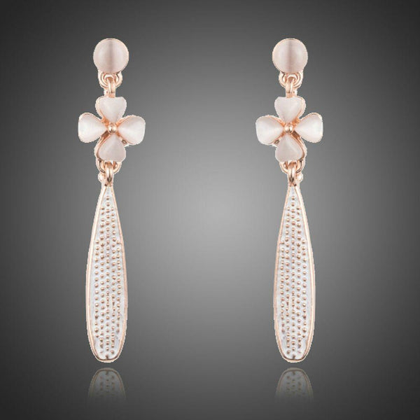 KHAISTA cactus flower crystal drop earrings on white background