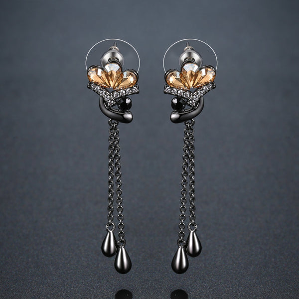 KHAISTA champagne crystal flower drop earrings on white background