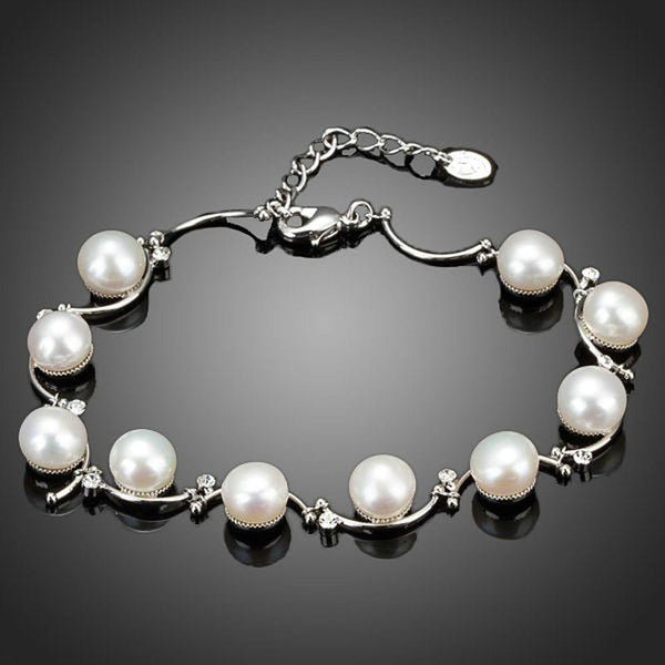 KHAISTA classic milk white crystal pearl bracelet on white background