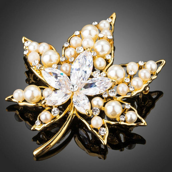 Khaista clear cubic zirconia maple leaf brooch on white background