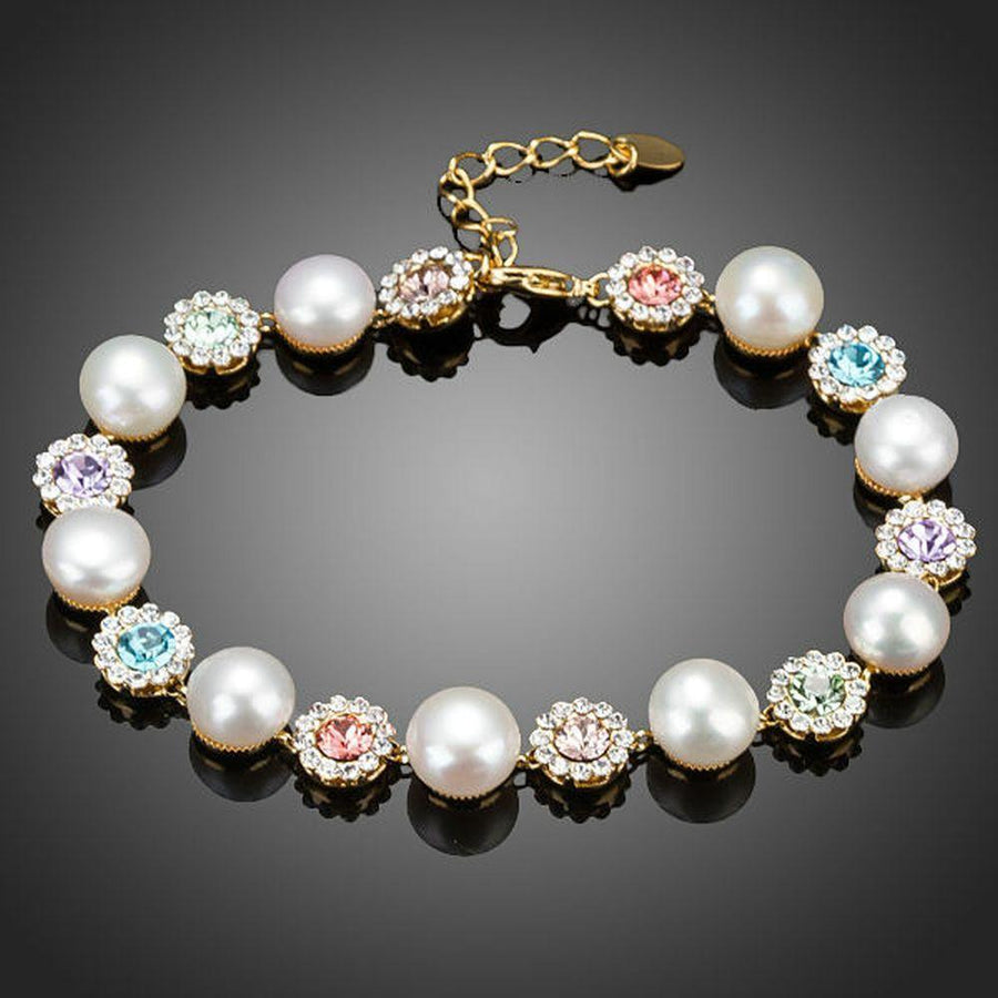 KHAISTA crystal flower stud pearl bracelet on white background