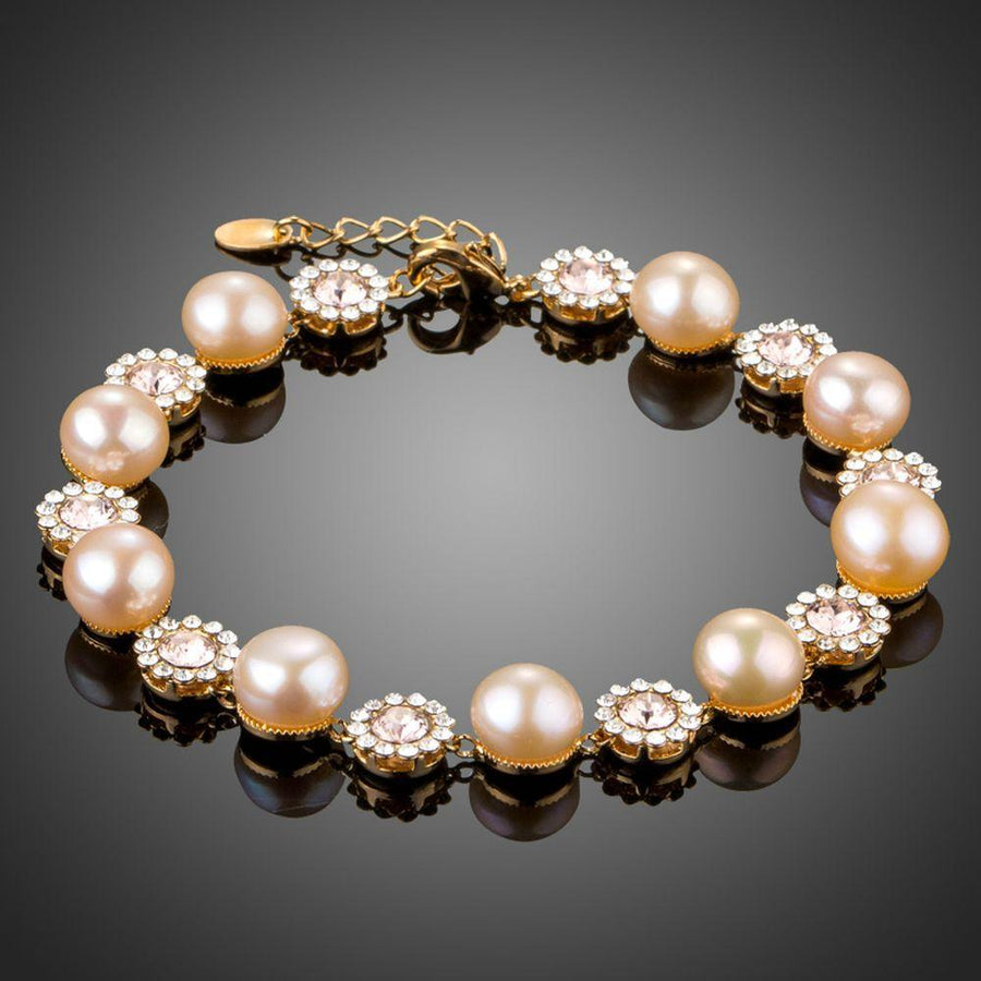 KHAISTA crystal flower pearl chain bracelet on white background