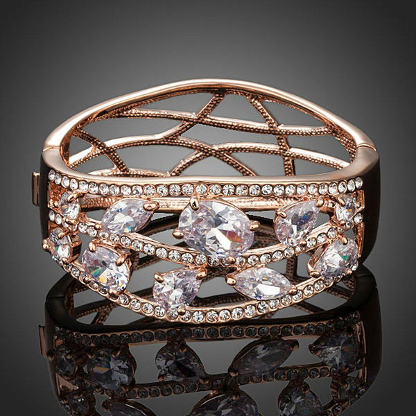 KHAISTA cubic zirconia cuff bangle on white background
