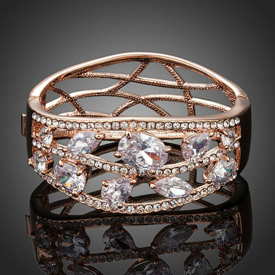 KHAISTA cubic zirconia cuff bangle on white background