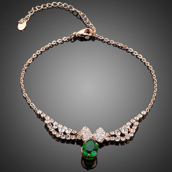 KHAISTA dark green CZ butterfly chain bracelet on white background