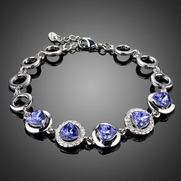 KHAISTA dark blue crystal chain bracelet on white background