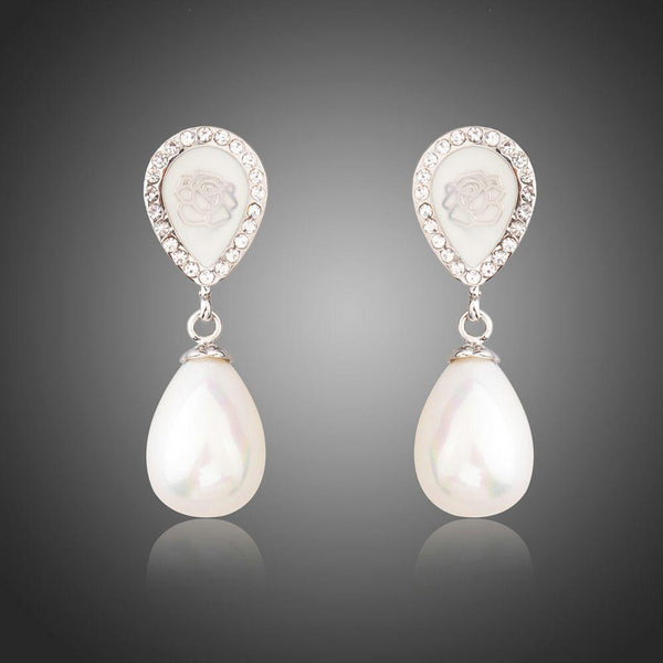 KHAISTA designer pearl drop earrings on white background