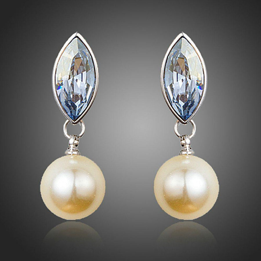 KHAISTA fancy pearl drop earrings on white background