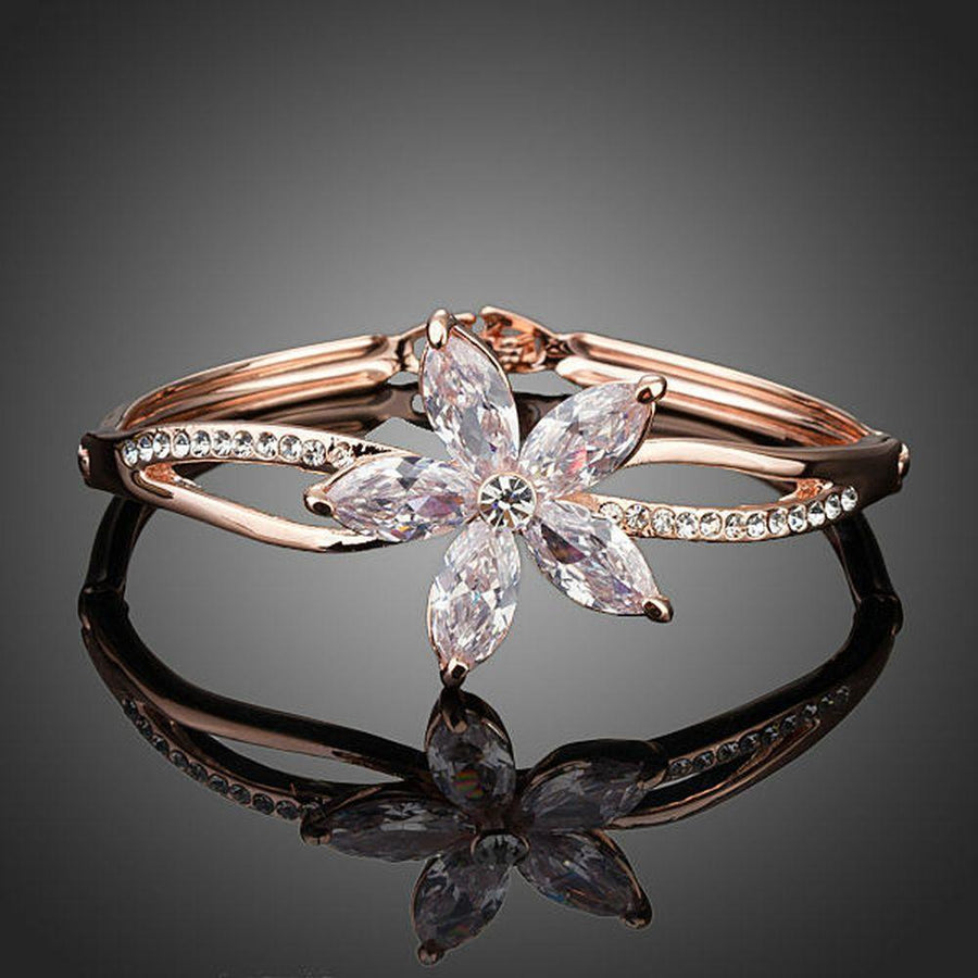 KHAISTA flower design CZ bangle on white background
