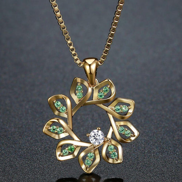 KHAISTA green CZ flower pendant necklace on white background
