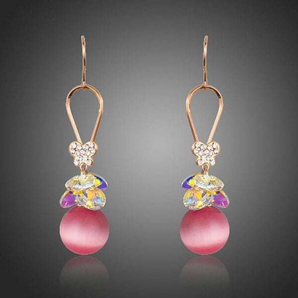 KHAISTA gold plated gradient pink drop earrings on white background