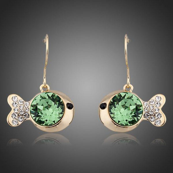KHAISTA gold plated green crystal fish drop earrings on white background