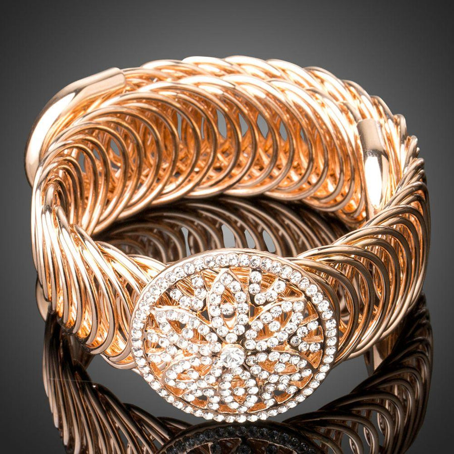 KHAISTA gold crystal hollow circle bangle on white background