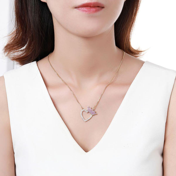 KHAISTA gold heart crown CZ pendant necklace on white background