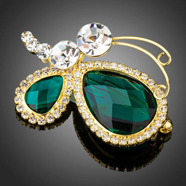 Khaista green Austrian crystal butterfly brooch on white background