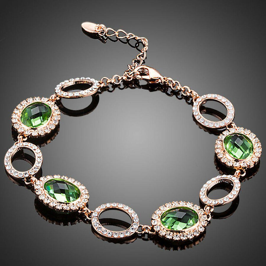 KHAISTA green stone designer bracelet on white background