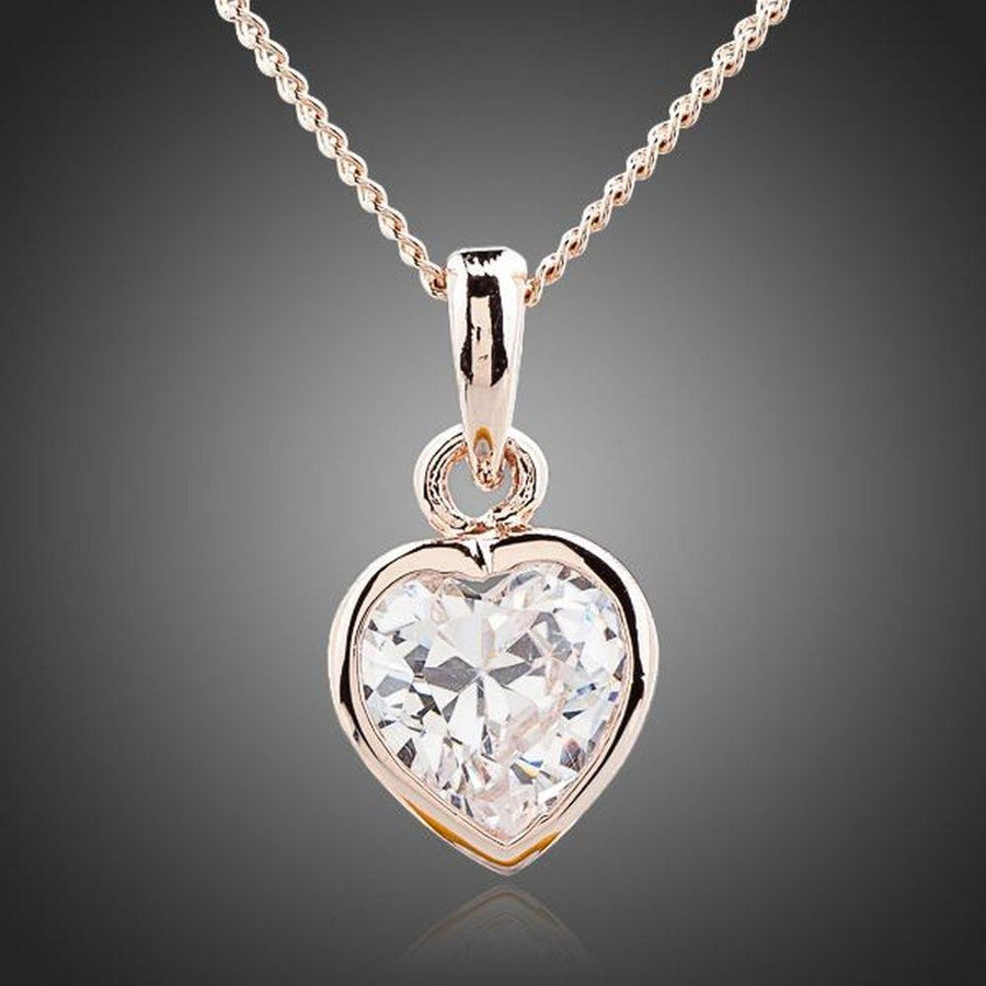 KHAISTA crystal heart pendant necklace on white background