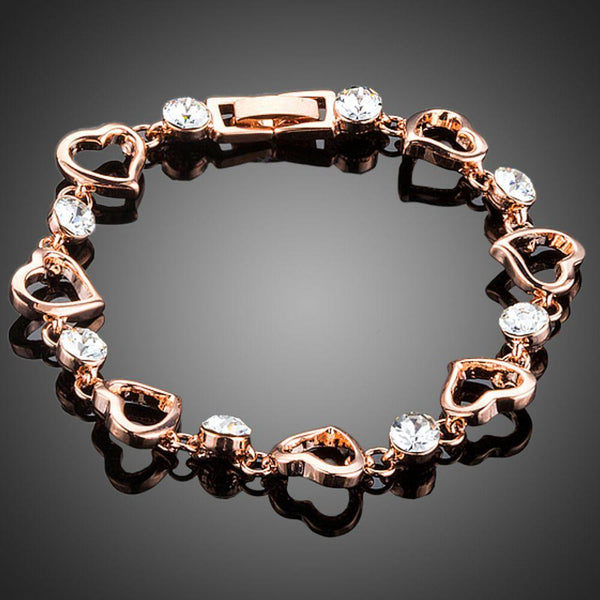 KHAISTA heart toggle clasp crystal bracelet on white background