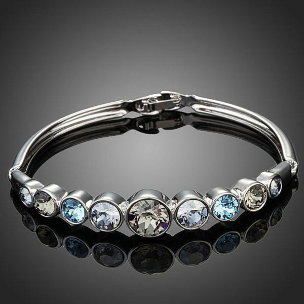 KHAISTA lightweight platinum crystal bangle on white background