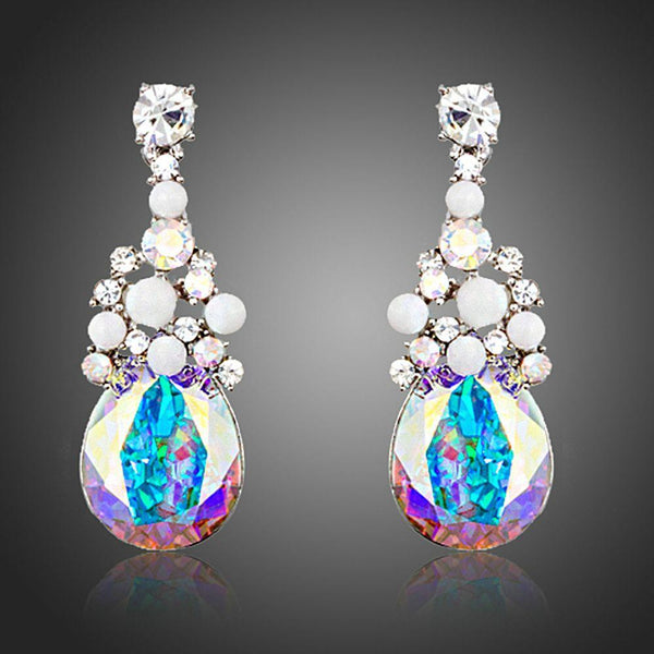 KHAISTA large crystal drop earrings on white background