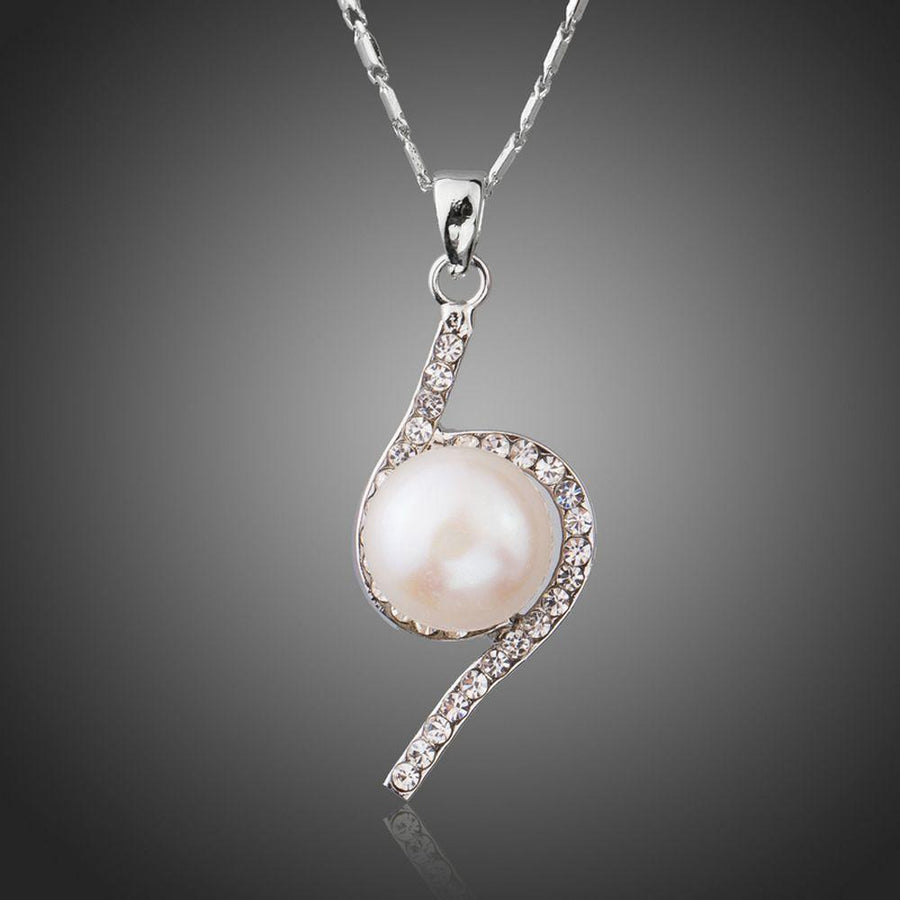 KHAISTA link chain flower pendant necklace on white background