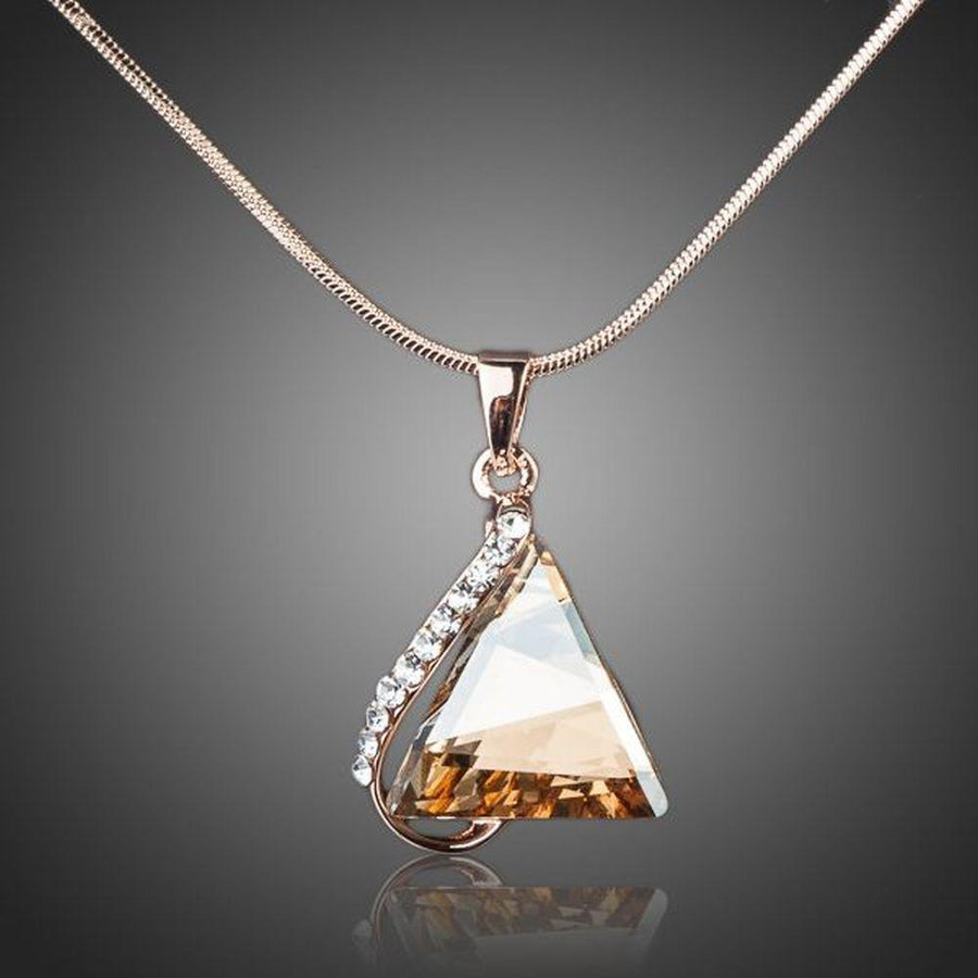 KHAISTA love triangle champagne crystal necklace on white background