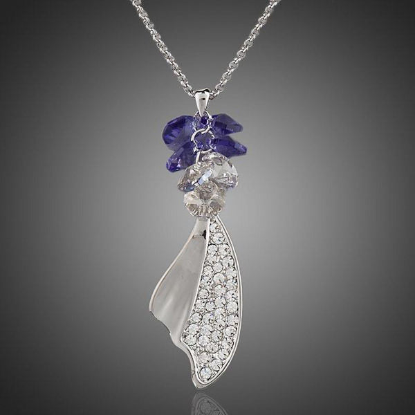 KHAISTA crystal machete pendant necklace on white background