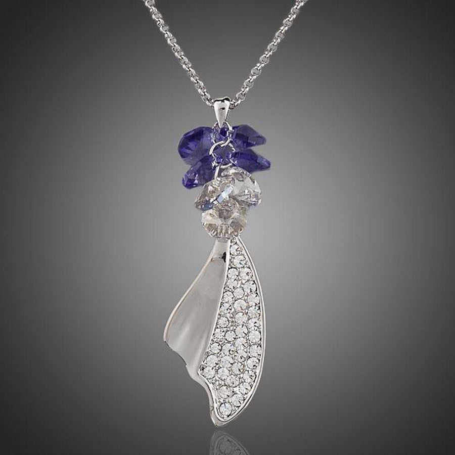 KHAISTA crystal machete pendant necklace on white background