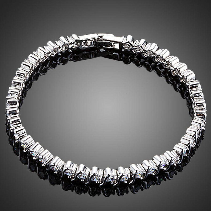 KHAISTA micro round CZ bezel bracelet on white background