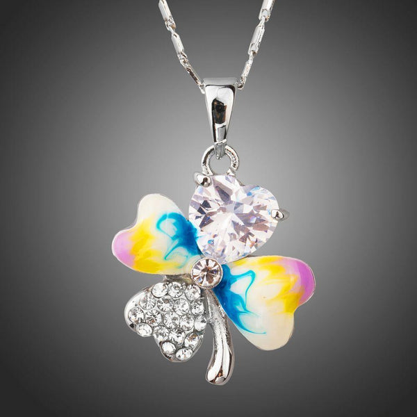 KHAISTA multicolour flower heart pendant necklace on white background