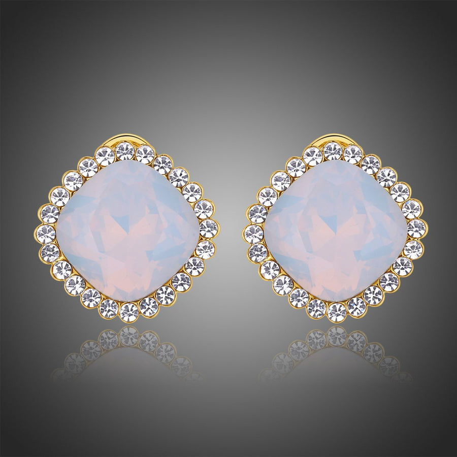 KHAISTA multicolour moonlight stud earrings on white background
