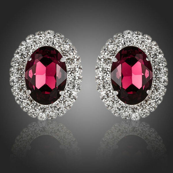 KHAISTA oval maroon CZ stud earrings on white background