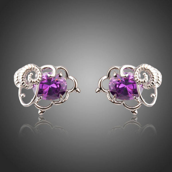 KHAISTA oval purple CZ stud earrings on white background