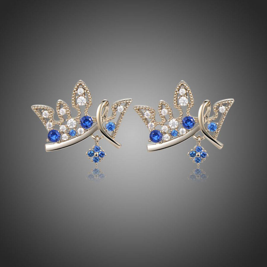 KHAISTA paved blue CZ crown stud earrings on white background