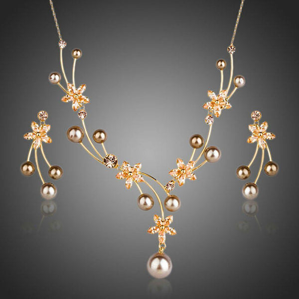 Khaista pearl floral drop earrings necklace set on white background