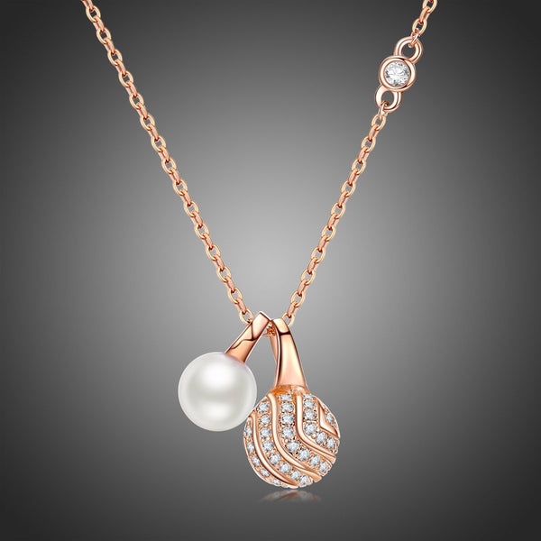KHAISTA pearl round ball CZ pendant necklace on white background