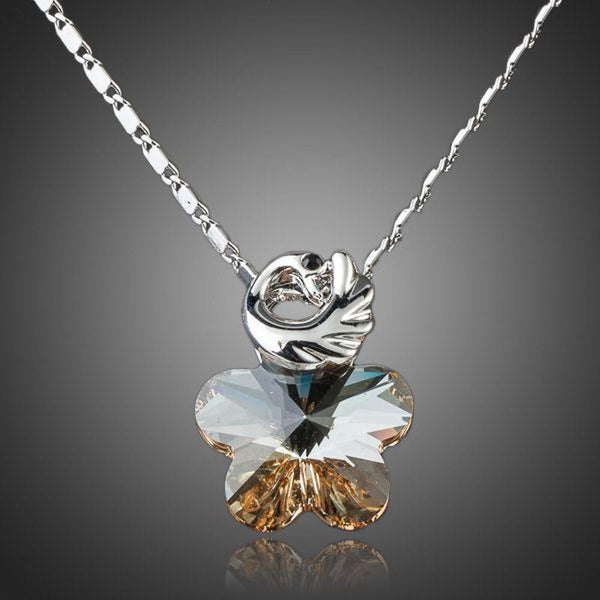 KHAISTA crystal pentagram pendant necklace on white background