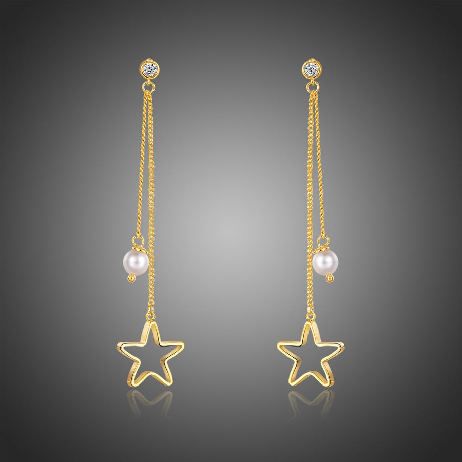 KHAISTA pentagram crystal drop earrings on white background