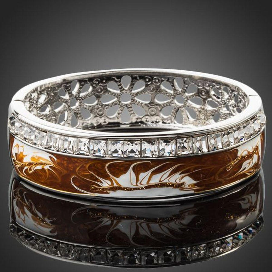 KHAISTA platinum plated caramel crystal cuff on white background